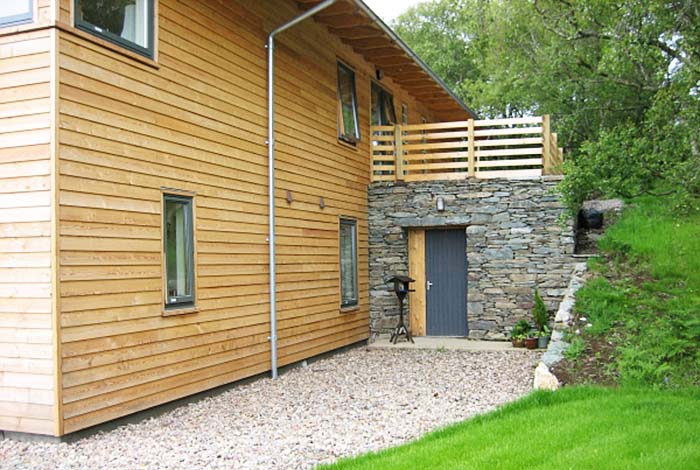 A house design for a steeply sloping site stuiable for a client with limited mobility